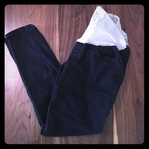 Maternity black skinny jeans with belly panel